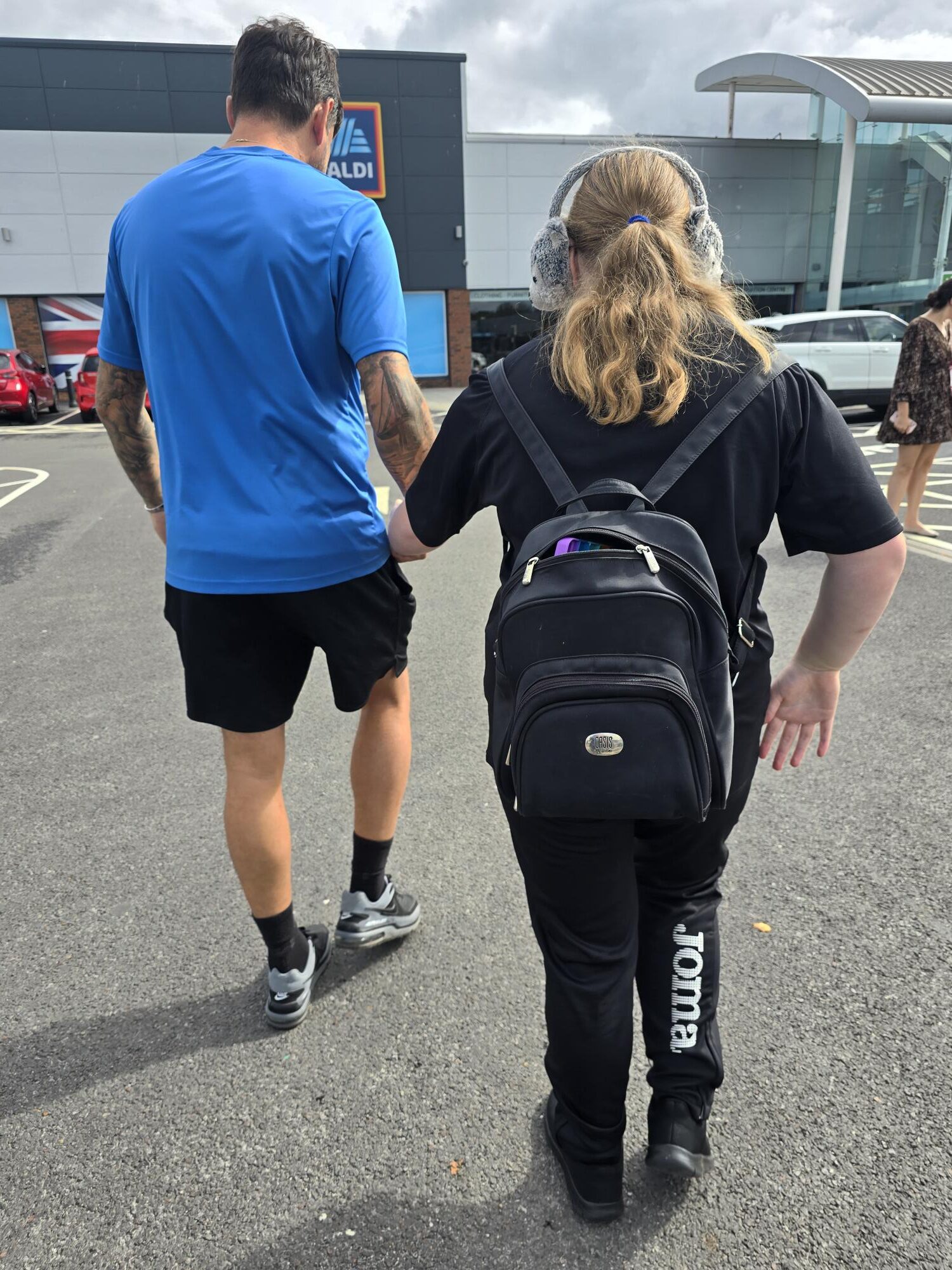 Mentor and student walking to the store